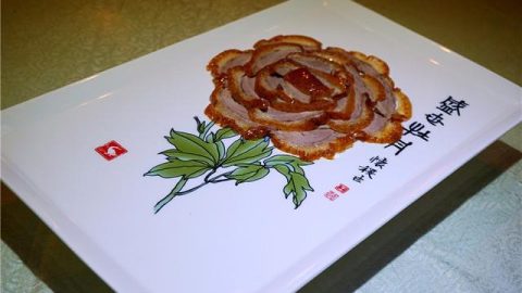 站在廣州大街上吃牛雜、「楓葉鴨」的北京味