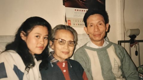 郁飛為父償還文債